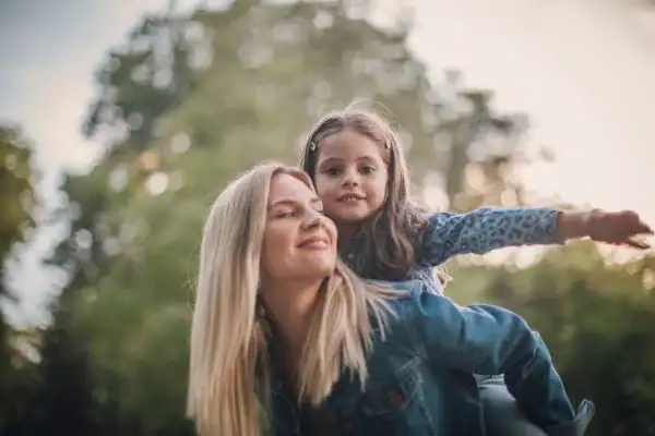 happy mum and daughter following mediation to resolve parental alienation East Sussex